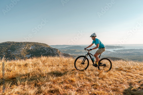 Man riding his mountain bike outdoor in nature