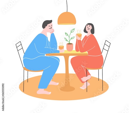 Man and woman sitting at the table drinking tea wearing pajamas. Cozy evening at home concept. Vector illustration.