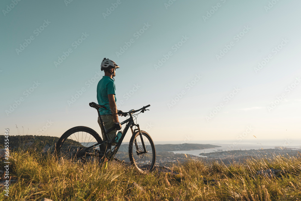 Man riding his mountain bike outdoor in nature