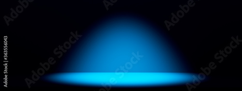 Photos Spotlight beam in dark blu space