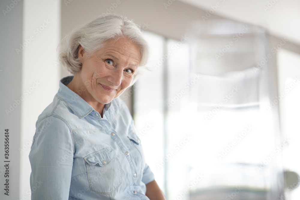 Portrait of smiling senior woman with white hair Portrait of smiling senior woman with white hair