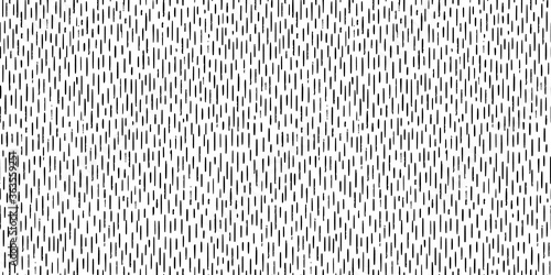 Hand-drawn black and white seamless texture with dashed strokes. Vector repeat pattern.