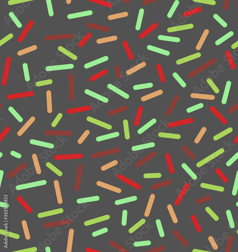 Confetti pattern on a dark background.