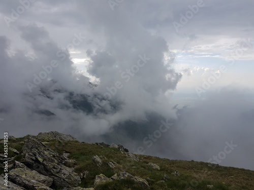 storm clouds over the mountains © overmix