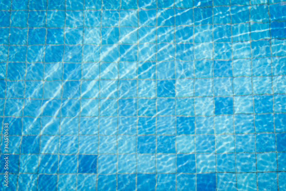 Swimming pool background with sun reflect wave on surface. Swimming pool background with sun reflect wave on surface.