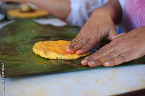 Hands Kneading Hallacas, typical Venezuelan food.