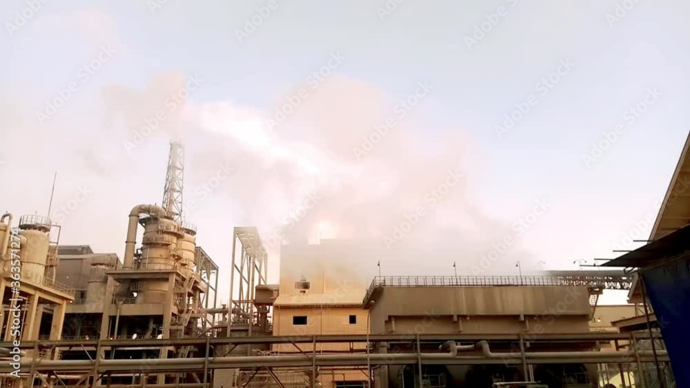 Factory chimneys. Environmental problems Environmental and air pollution in big cities, Industrial pipes pollute the atmosphere with smoke