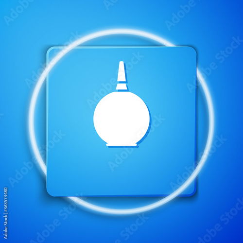 White Enema icon isolated on blue background. Enema with a plastic tip. Medical pear. Blue square button. Vector Illustration.