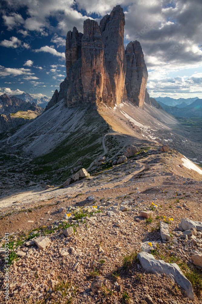 Three Peaks of Lavaredo. Image of Italian Dolomites with famous Three Peaks of Lavaredo (Tre Cime di Lavaredo) South Tyrol, Italy, Europe at summer sunset.