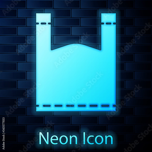 Glowing neon Plastic bag icon isolated on brick wall background. Disposable cellophane and polythene package prohibition sign. Vector Illustration.
