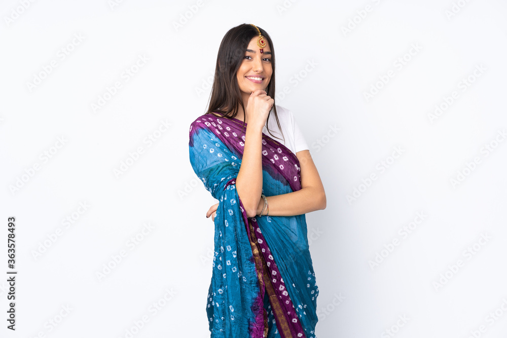 Young Indian woman isolated on white background smiling Young Indian woman isolated on white background smiling