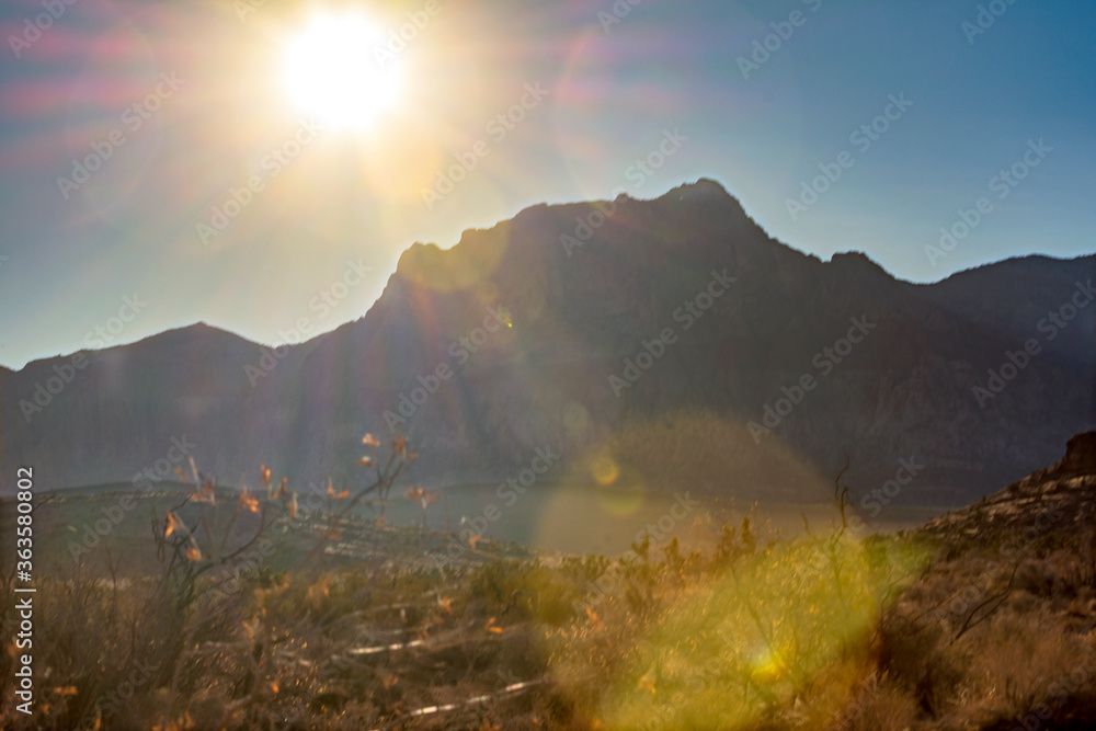 Plakat sun over the mountains near las vegas