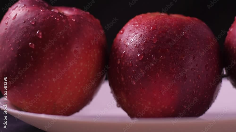 Red fresh apples on the table.Fruit on the table is a healthy food. Red fresh apples on the table.Fruit on the table is a healthy food.