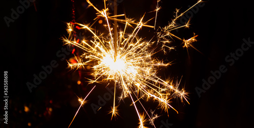 Bengali fire. Festive firework salute burst. Festive new year background.