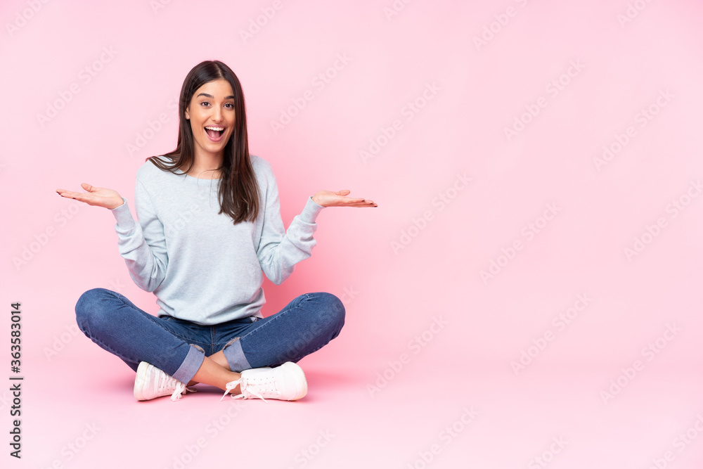 Young caucasian woman isolated on pink background with shocked facial expression Young caucasian woman isolated on pink background with shocked facial expression