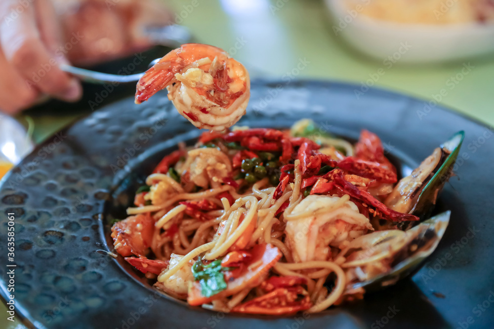 Spaghetti with Spicy prawn and Mixed Seafood, focus selective. Spaghetti with Spicy prawn and Mixed Seafood, focus selective.