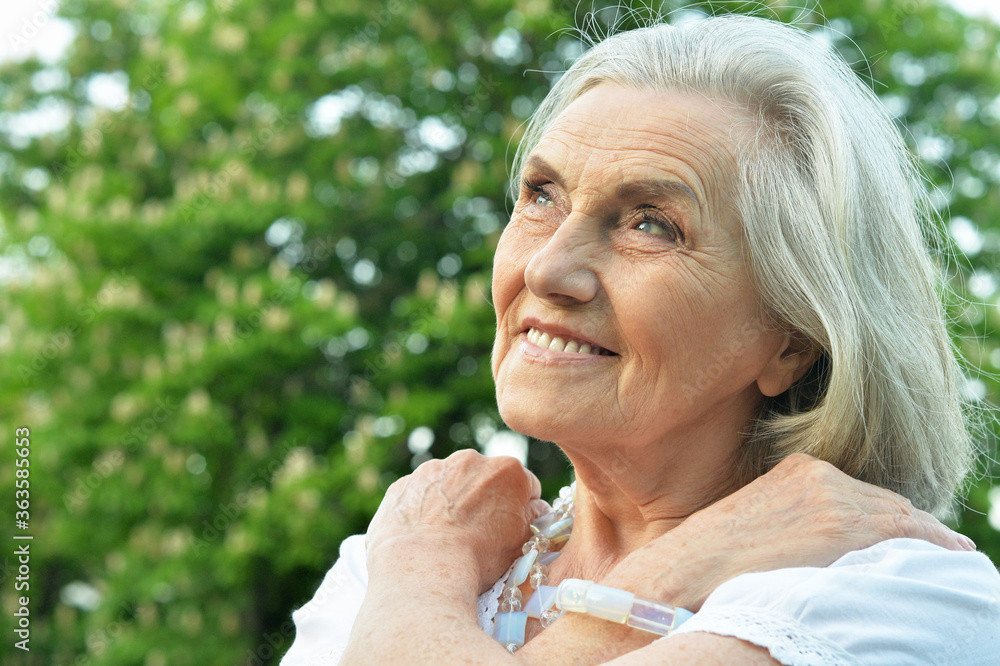 Close up portrait of senior beautiful smiling woman