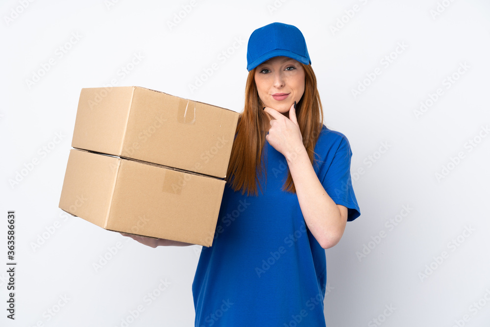 Young delivery woman over isolated white background laughing Young delivery woman over isolated white background laughing