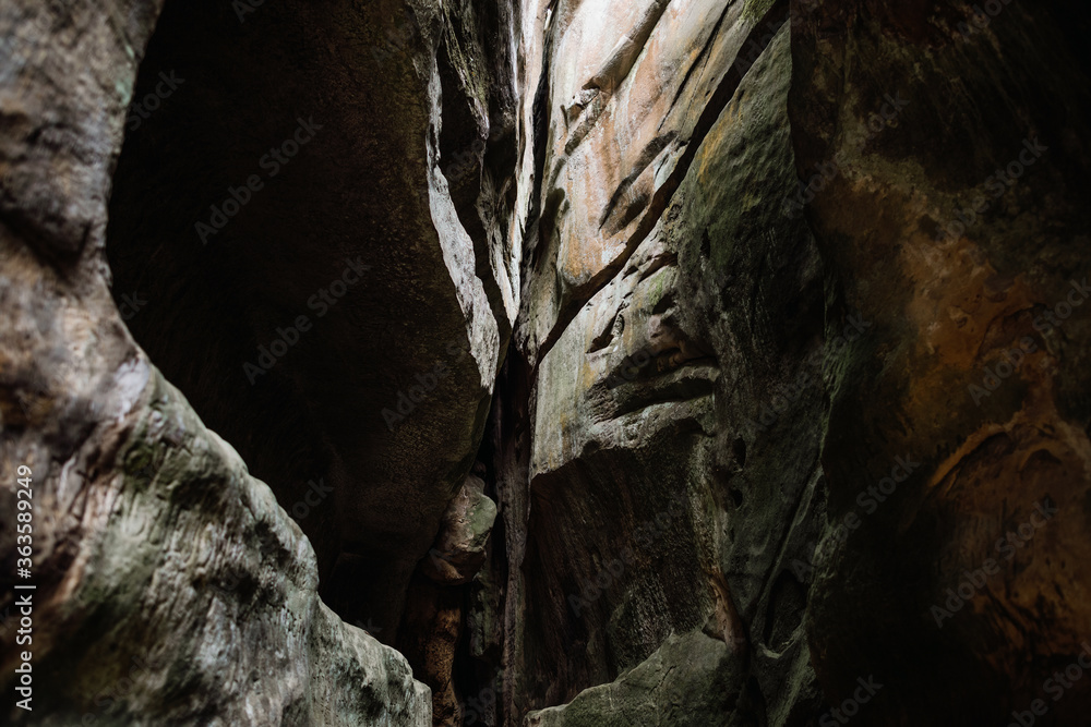 Mountain gorge. Rock texture. Caves in the mountains