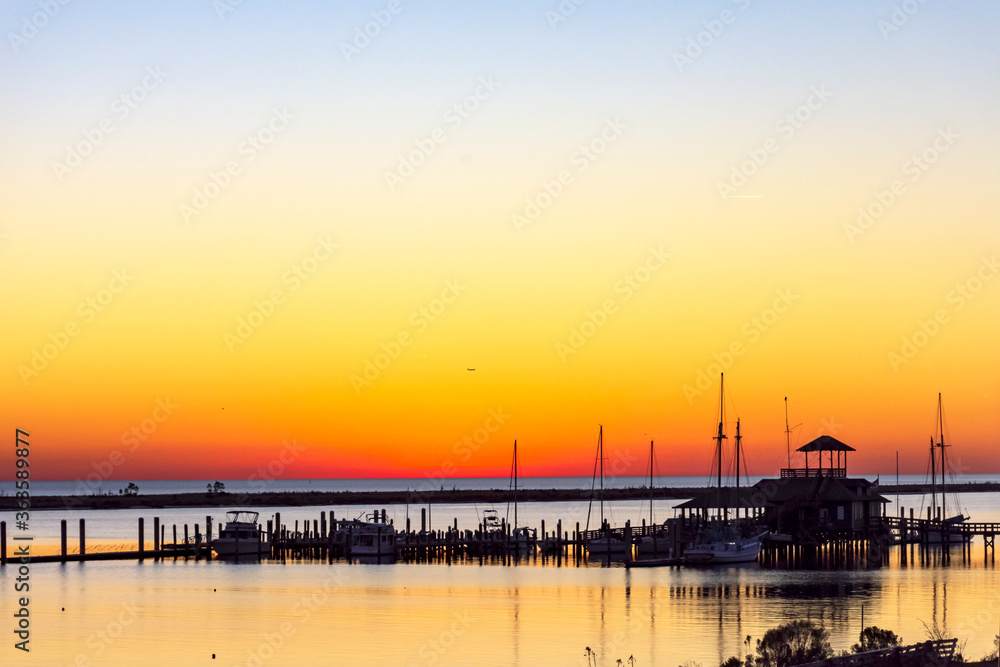gorgeous colorful sunset on the gulf of mexico in biloxi, mississippi