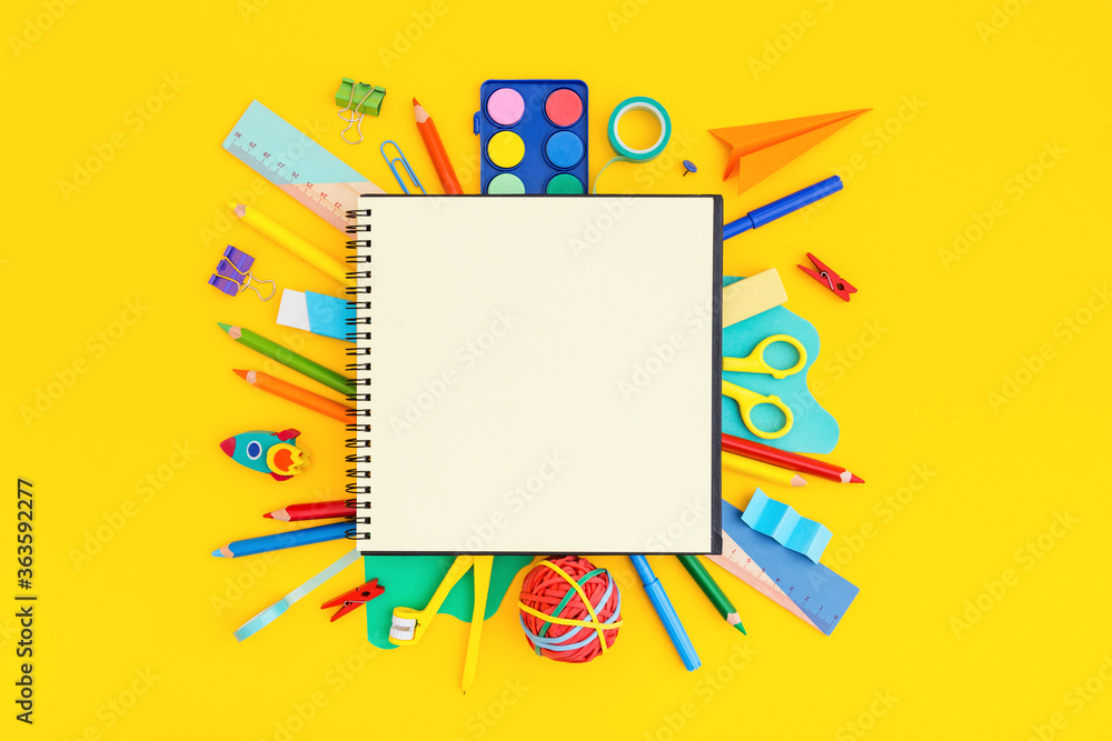 School notebook with school supplies on grid background. Back to school. Elementary school concept.	
 - obrazy, fototapety, plakaty 
