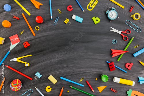 School blackboard and supplies