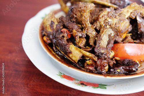 Tengkleng Kambing Pak manto, Solo, Central Java, Indonesia. Traditional Indonesian spicy food made from the bones of goat.