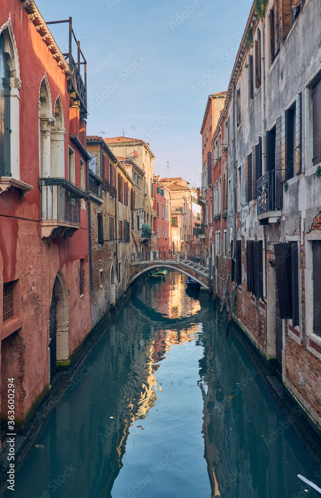 canal in Venice Italy red wall