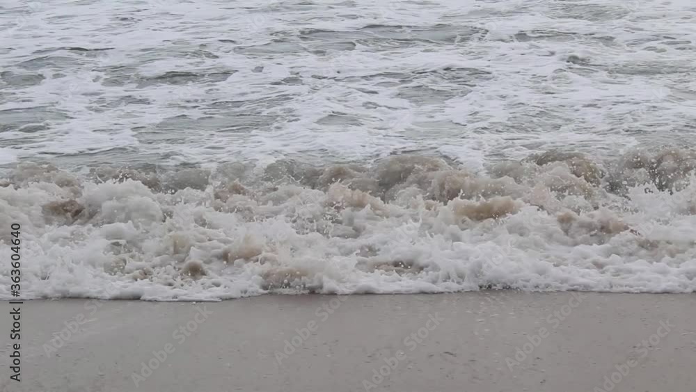 Sea waves hiting on the shore