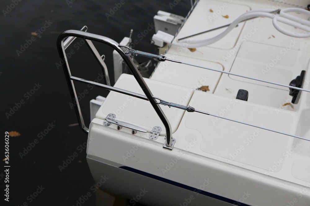 Fototapeta premium elements and fastenings of a yacht, boats, technical part, bolts, ladder, tape measure, cables, ropes, frame, yacht.