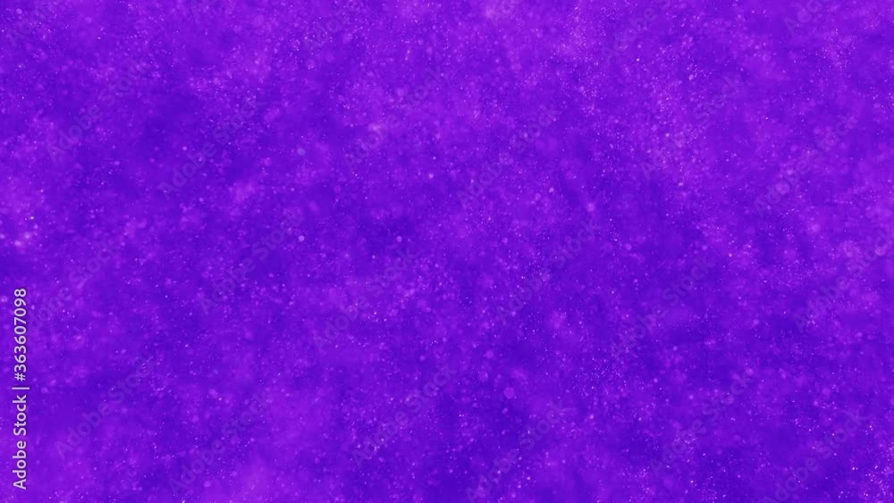 Purple particles sparkling and swirling cloud in clear fluid on dark background. Vj, tech vlogger and abstract motion art concepts.