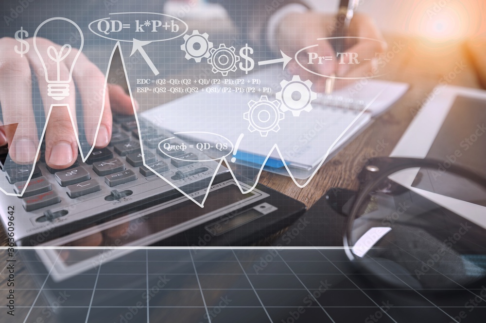Accountant man hand with a calculator and documents Accountant man hand with a calculator and documents