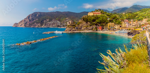A panorama view across Monterosso al Mare, Italy from the path to Vernazza in summer