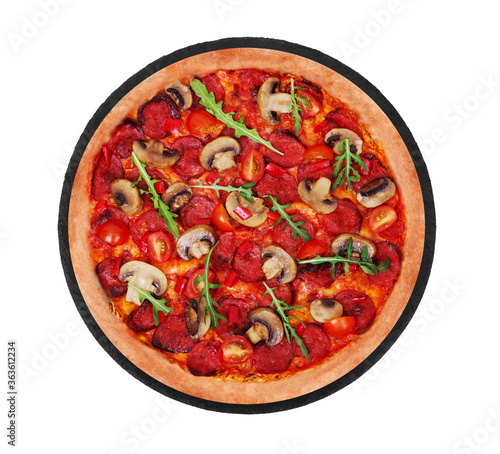 Tasty pizza hot with spicy salami, arugula, cherry tomatoes, mushrooms and texas spice mix, on a slate platter, isolated on white background, top view