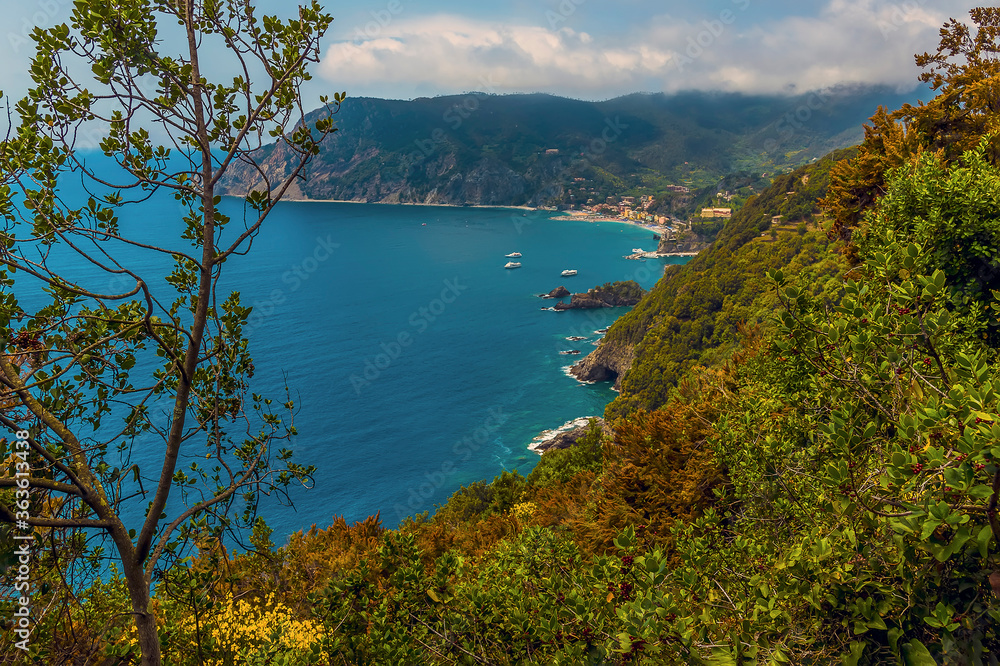 A panorama view over Monterosso al Mare from the Monterosso to Vernazza path in summertime A panorama view over Monterosso al Mare from the Monterosso to Vernazza path in summertime