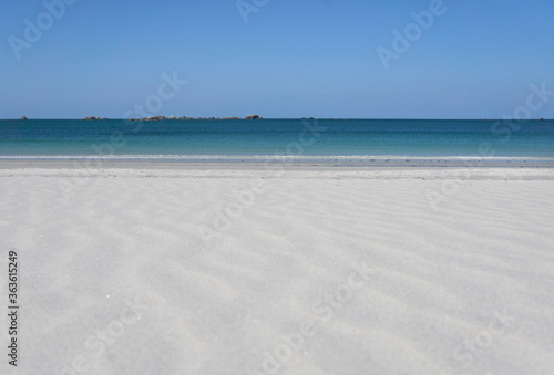 white sand beach and blue turquoise sea