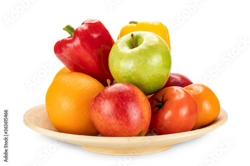 Plate of fresh fruits on a white background