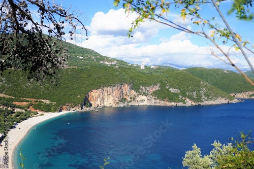 view over lichnos bay in greece with very blue and clear sea