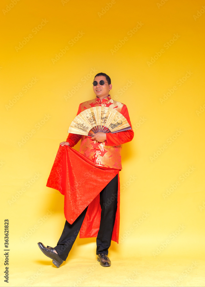 Male models in traditional Chinese wedding costumes.