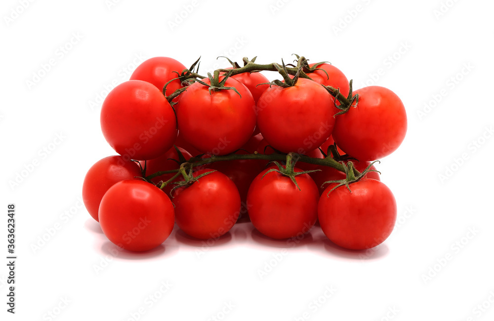 Several red ripe tomatoes on a light background. Natural product. Natural color. Close-up. Several red ripe tomatoes on a light background. Natural product. Natural color. Close-up.