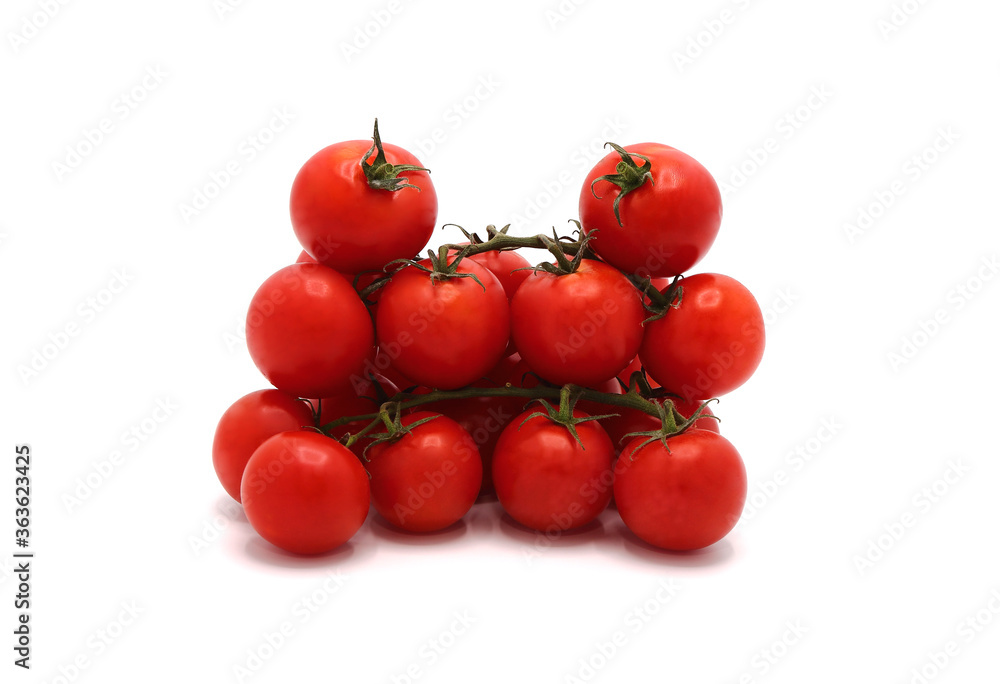 Several red ripe tomatoes on a light background. Natural product. Natural color. Close-up.
