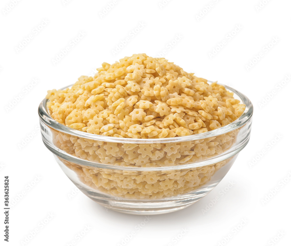 Glass bowl of uncooked stelline pasta Glass bowl of uncooked stelline pasta