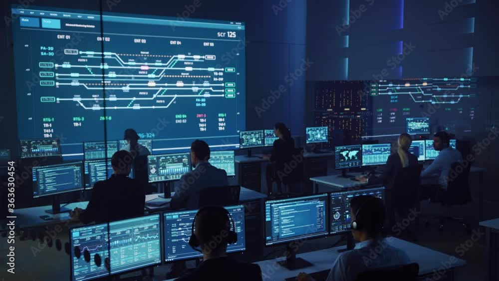 Team of Professional Computer Data Science Engineers Work on Desktops ...