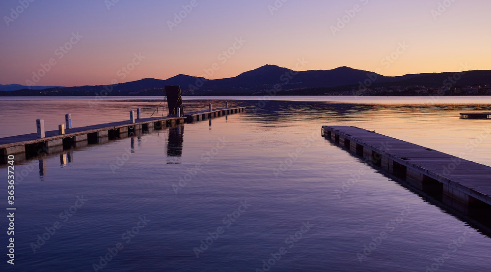 Fototapeta premium Golfo Aranci harbor in the sunset