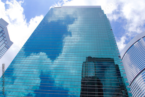 Window glass, Modern architecture in the blue sky white cloud city