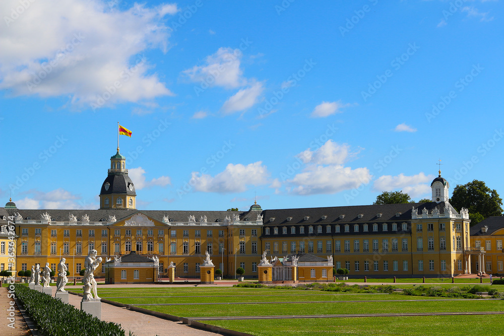 Karlsruhe Palace with sculptures of mythology erected in 18th century (Karlsruhe, Germany)