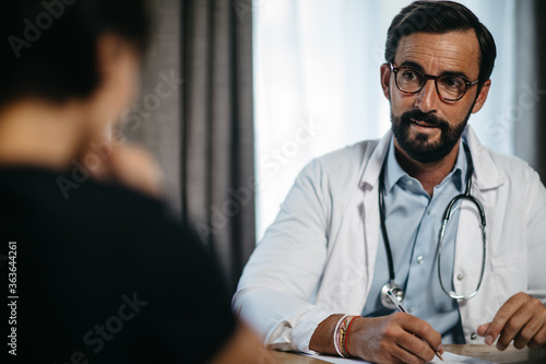 portrait of a doctor during a patient consultation
