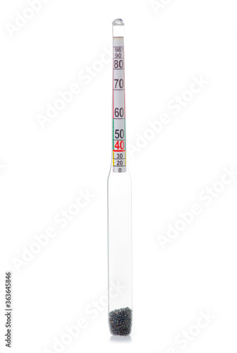 Glass alcohol meter for determining the amount of alcohol on white background isolation