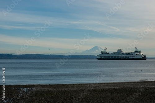 Bainbridge Island ferry crossing in Puget Sound against backdrop of Mount Rainier