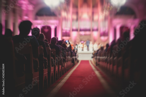 A view of philharmonia philharmonic concert hall isle with pipe organ and orchestra playing classical music in the backround